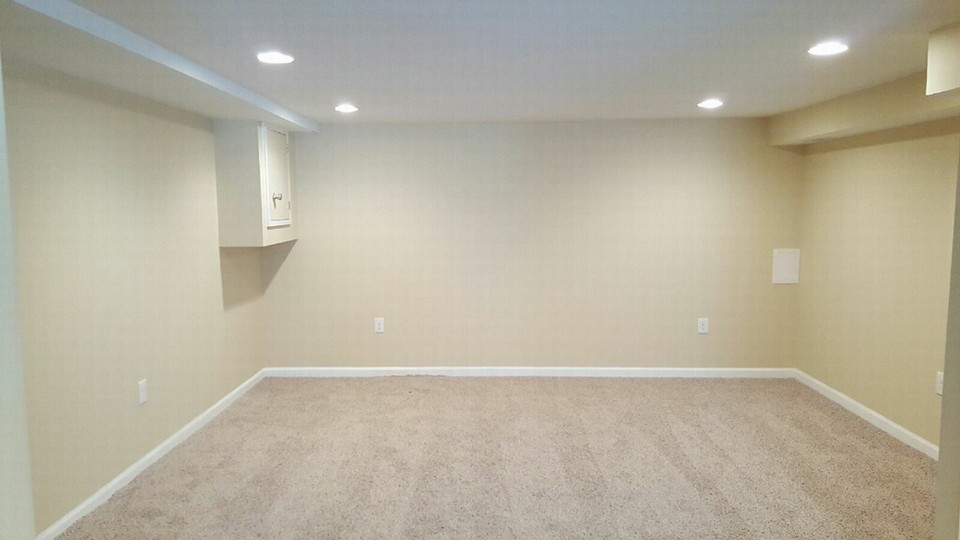 very large finished basement with half bath