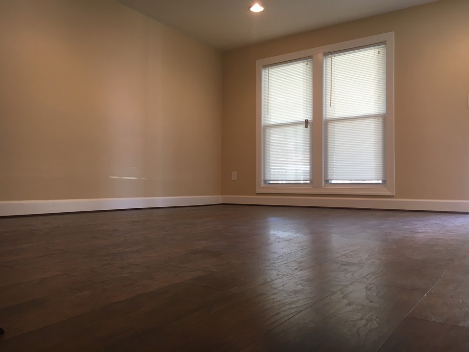 large living room with brand new flooring